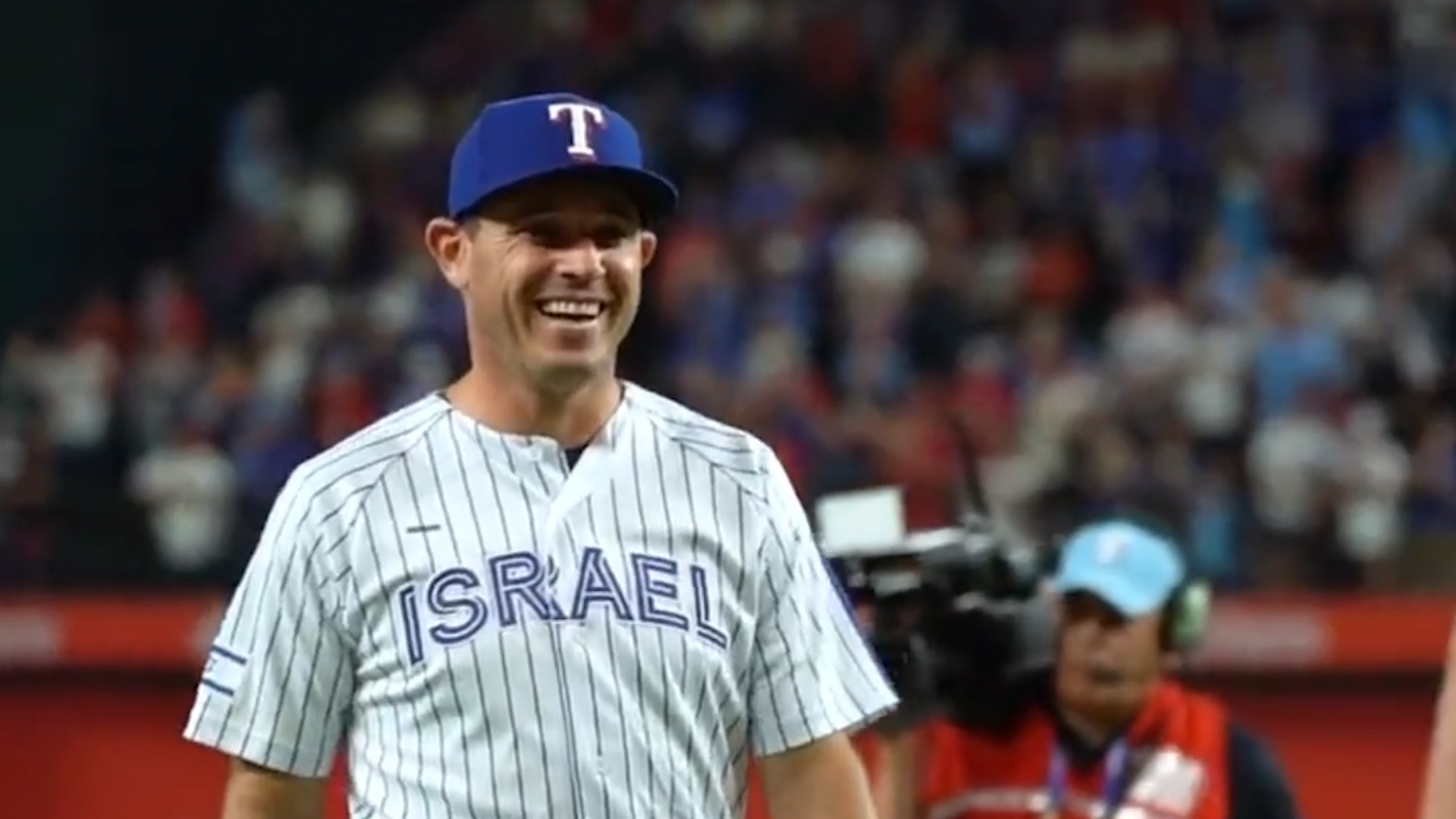 Texas Rangers legend Ian Kinsler wears Team Israel jersey during